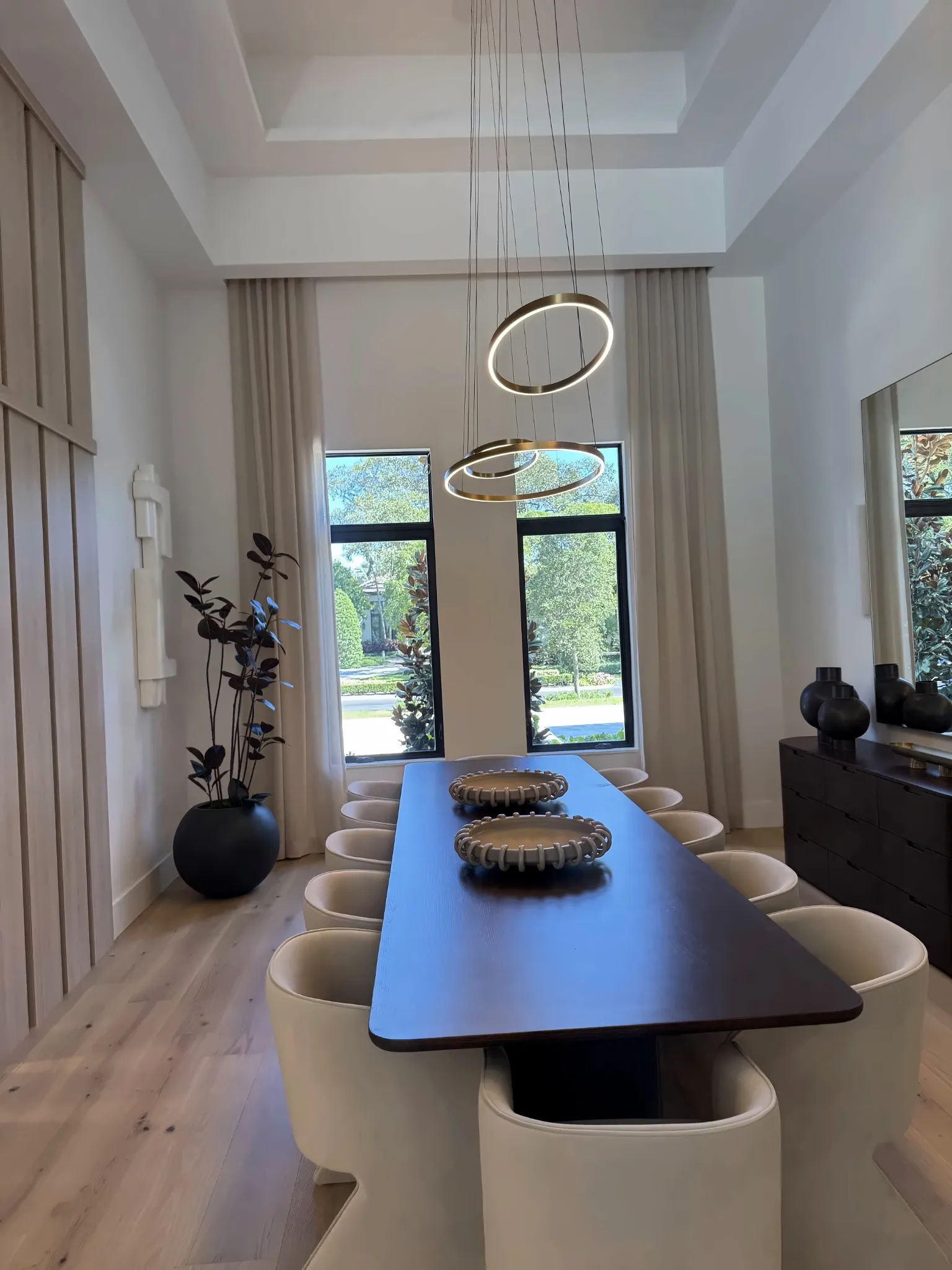 modern-dining-room-pendant-rings-sheer-drapery-enhanced